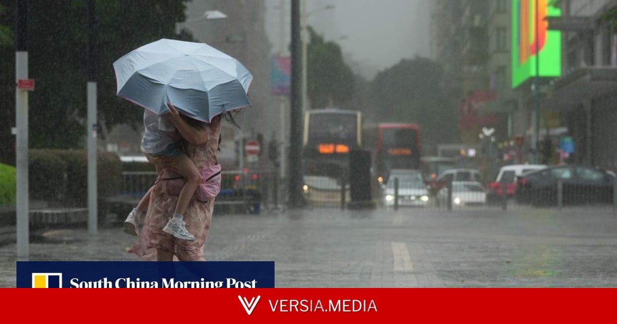 Hong Kong issues amber rainstorm warning amid caution over gusts and swells